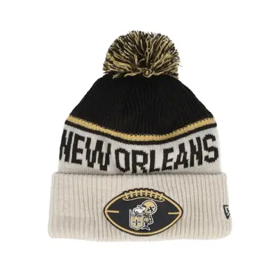 New Era - NFL Beige pom Beanie - New Orleans Saints NFL24 Sideline His Sportknit Stone/Black Pom @ Hatstore