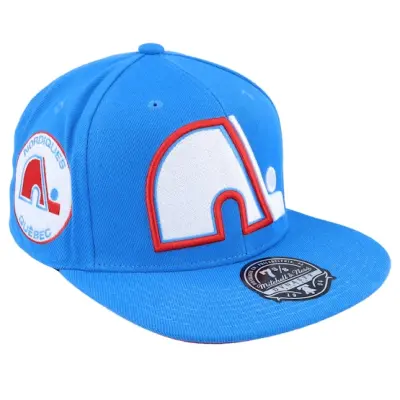 Mitchell&Ness - NHL Blå fitted Keps - Quebec Nordiques Vintage Blue Fitted @ Hatstore