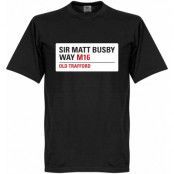 Manchester United T-shirt Sir Matt Busby Way Sign Svart L